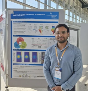 PhD Student Rushab Bansilal Jain with the Dig-e-Farm poster